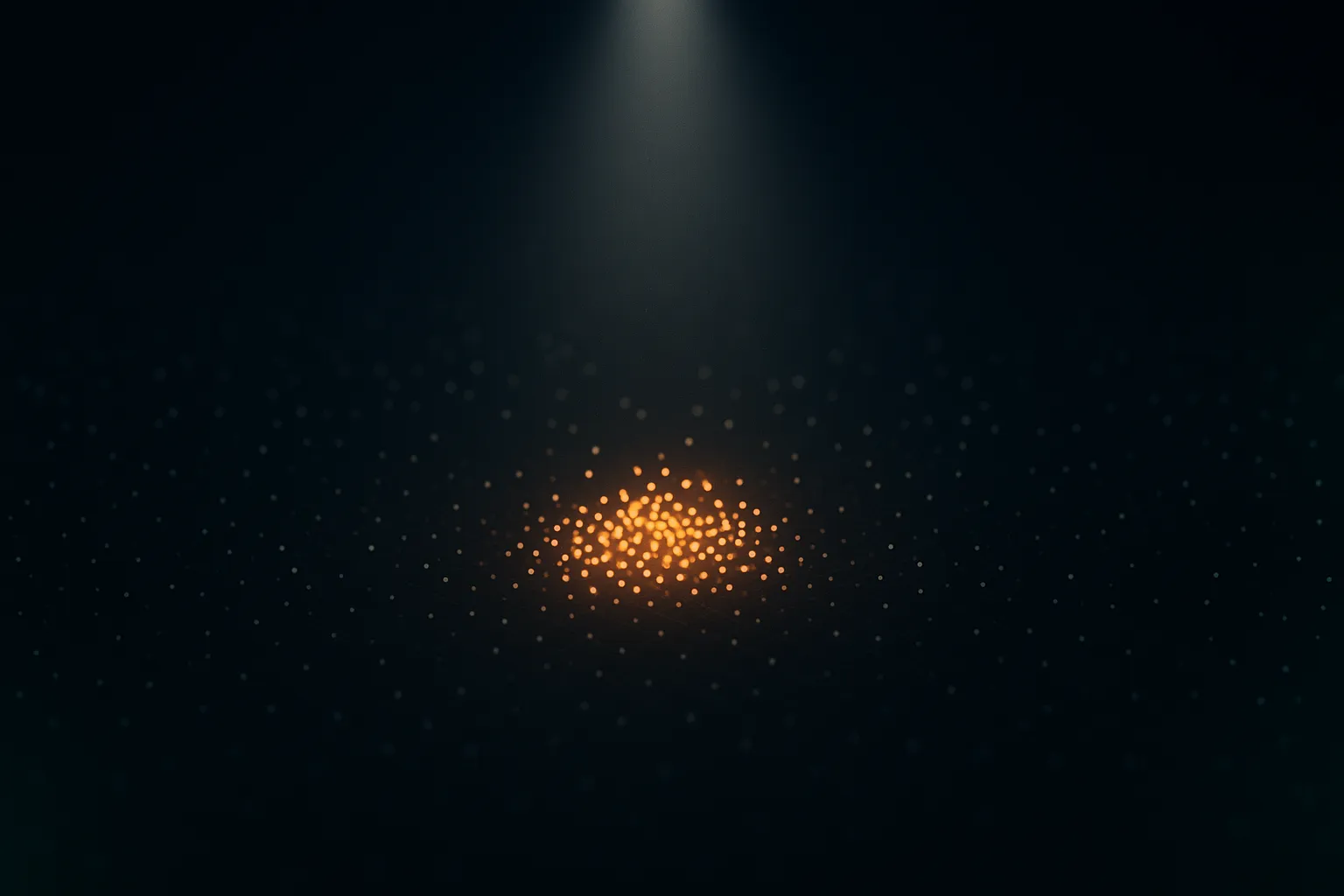 A wide loose field of dim grey dots with one tight cluster of warm amber dots picked out by a narrow cone of pale light falling from above